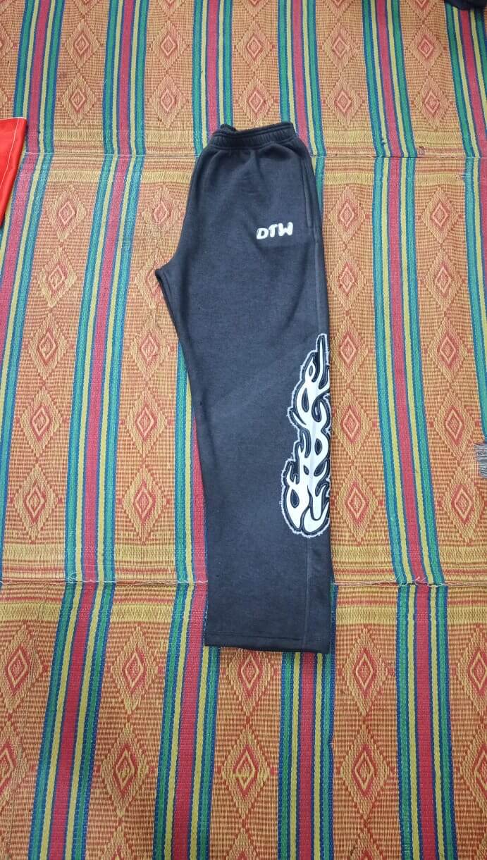 Gray DTW pants featuring a stylish flame design, perfect for comfort and daily wear.