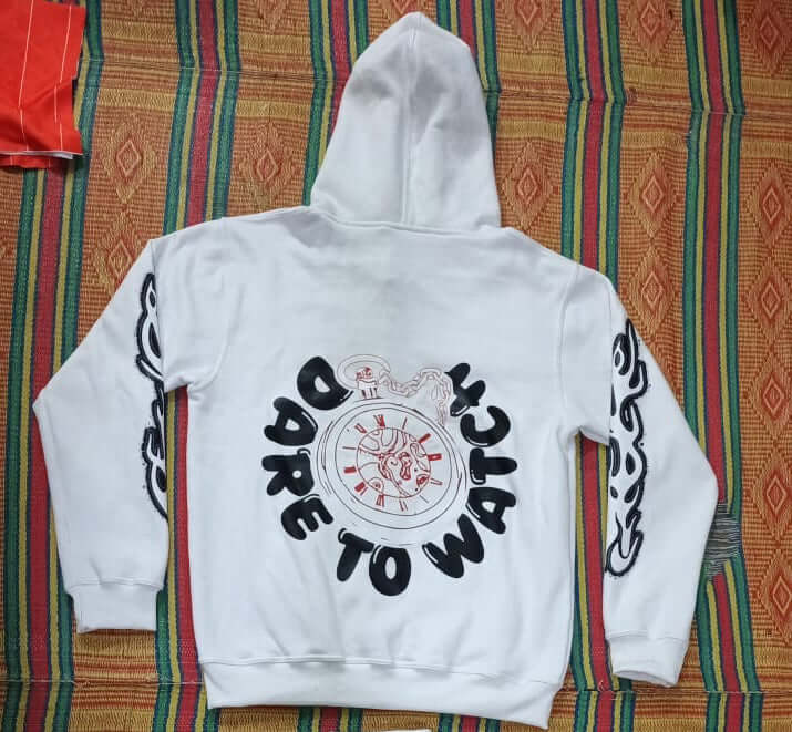 White DTW hoodies featuring a bold graphic design on the back and stylish sleeves.