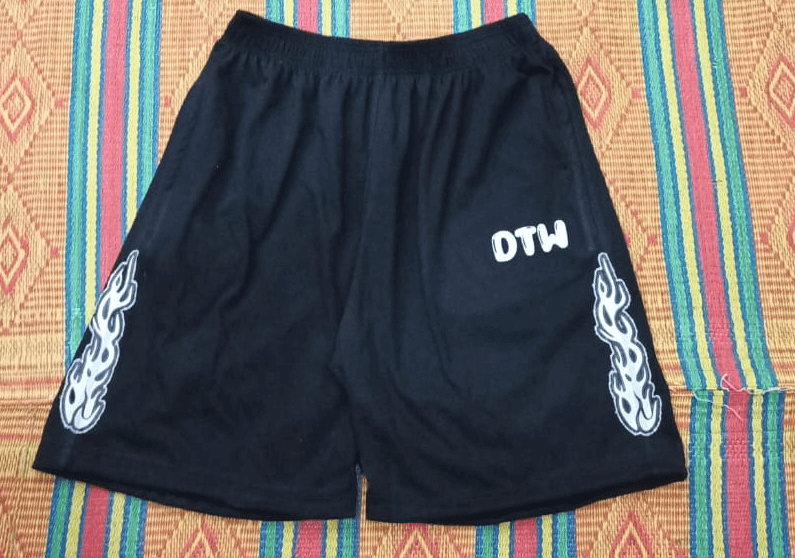 Stylish black shorts featuring flame designs and DTW print, perfect for casual wear or workouts, Shorts collection.