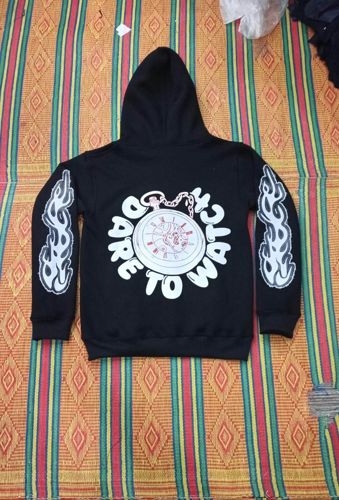 Black DTW hoodies featuring bold graphics and stylish flame design for ultimate comfort and performance.