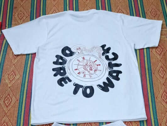 While DTW t-shirts featuring a graphic design with the words 'Dare to Watch' on the back.
